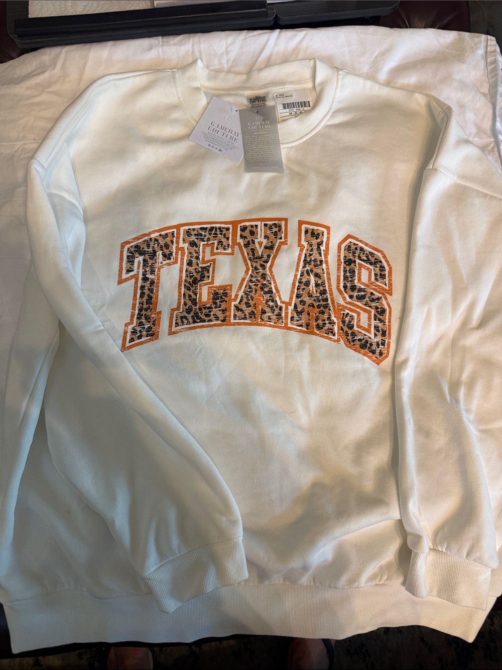 Fanatics White Sweatshirt with Leopard 'TEXAS' Appliqué and Orange Trim